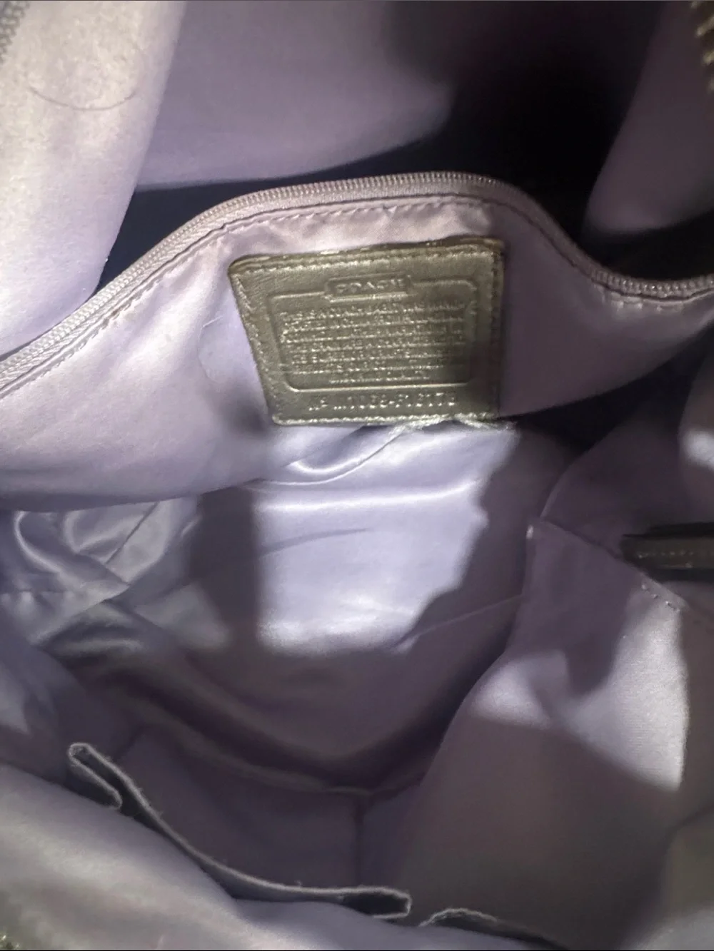 Coach Y2K Madison hobo bag featuring metallic pewter leather and silver studded
